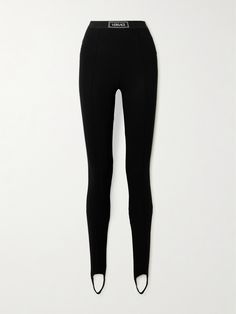 There's something about stirrup leggings that's just so chic. Versace's pair is made from stretch-jersey with a jacquard-woven logo waistband.  Style yours with pumps or ballet flats, as on the label's Fall '24 runway. Stirrup Leggings, Sport Swimwear, Exclusive Dress, Fall 24, Stirrups, Summer Hats, Black Stretch, Black Media, Jeans Dress