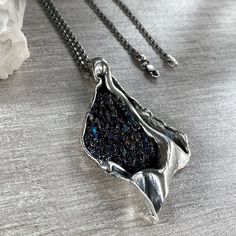 Handmade abstract pendant, Raw carborundum crystal necklace in Sterling silver, Freeform black druzy pendant for women, Raw crystal pendant Absolutely handmade silver pendant with raw carborundum crystal. This is a perfect gift idea to those who love unique, exclusive pieces and abstract style. Also, perfect for women who love designer jewelry! The stone has a shiny and adorable look. It has a very beautiful sparkle under the sun. 【FULL DETAILS】 ► Gemstone: natural raw carborundum Pendant length Unique Silver Necklace With Raw Stone, Elegant Raw Stone Crystal Pendant Necklaces, Raw Stone Silver Pendant Jewelry, Silver Raw Stone Pendant Jewelry, Silver Pendant With Raw Stone, Elegant Pendant Crystal Necklaces With Raw Stone, Elegant Crystal Pendant Necklaces With Raw Stone, Silver Pendant Necklace With Raw Stone, Silver Pendant Crystal Necklace With Raw Stone