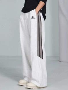 Upgrade your casual wardrobe with our Casual Sweatpants with Bootcut and Stripes. Designed for both comfort and style, these sweatpants feature a flattering bootcut and trendy stripes. Perfect for lounging or a casual day out. Size Chart: Size (in cm) S M L XL Length 102 104 106 108 Waist 64 68 72 76 Hip 100 104 108 112 More Sizing Information Below Unique Clothing Style, Striped Sweatpants, Mens Cardigan Sweater, Vest Blazer, Casual Sweatpants, Cami Shirt, Japanese Street Fashion, Unique Outfits, Cardigan Jacket