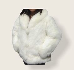 STUNNING UNISEX WHITE BABY ALPACA FUR COAT Styled and glamorous Baby Alpaca fur coat handmade of 100% genuine baby alpaca fur. Value for money is what every buyer seeks to achieve when buying any item. In the recent past, fur coats have gained popularity, and everyone wants to have as many of these as they can afford. Indeed, the coats are luxurious and investment because of many reasons. Size available : XS - S - M - L - XL - XXL Material: 100% baby Alpaca fur. Garment Type: fur coat Washing In Fluffy Winter White Fur Coat For Winter, Winter White Fluffy Fur Coat For Winter, Winter White Faux Fur Coat For Cold Weather, White Fluffy Long Sleeve Fur Coat, White Faux Fur Lined Coat For Cold Weather, White Fluffy Elegant Fur Coat, Elegant White Fluffy Fur Coat, White Fur Coat With Faux Fur Lining For Winter, White Faux Fur Lined Coat For Winter