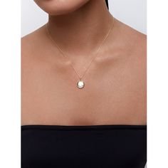 14kt Mother of Pearl Diamond Dot Coin Necklace When we think of an everyday necklace, this is it. A lustrous mother of pearl disc is set in a coin case and set with a bezeled diamond. Hangs magnificently from a 16" diamond cut chain with sparkles. This necklace is adjustable as it comes with a 2"in extension as well. Adore! 14kt Yellow Gold 2.50gm Gold 10mm Mother of Pearl 0.02ct Diamonds 16" + 2" ext Chain Lobster Lock Elegant Diamond Necklace With Coin Pendant, Elegant Pearl Necklace With Coin Pendant, Elegant White Coin Necklace With Round Pendant, Elegant White Round Pendant Coin Necklace, Elegant Round Pendant Coin Necklace With Polished Finish, Elegant Round Disc Coin Necklace, Elegant Coin Necklace, Elegant White Round Disc Jewelry, Elegant Sterling Silver Round Disc Coin Necklace