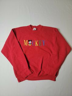 Vintage Disney Store Crew Neck Sweatshirt; Youth Large; Mickey Red. Gently used with some stains - please see pictures which include measurements. Feel free to ask questions Ships in 1-2  business days after payment. Thank you for your interest Lot K 10 Red College Sweatshirt With Embroidered Logo, Retro Red Cotton Sweatshirt, Red Retro Cotton Sweatshirt, Vintage Red Cotton Sweatshirt, 90s Red Cotton Sweatshirt, 90s Red Letter Print Sweatshirt, 90s Style Red Letter Print Sweatshirt, 90s Style Red Sweatshirt With Letter Print, Red Long Sleeve Mickey Mouse Sweatshirt