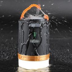 an electronic device with water splashing out of it