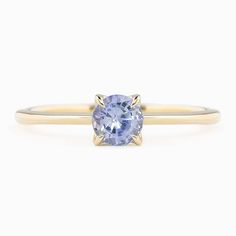 * In stock and ready to ship in size 7 * Ceylon blue sapphire approx. 5mm(0.50ct) round, eye clean * Colors may vary slightly as they are genuine gemstones * Band width: 1.1-1.6mm tapered band * High profile four prongs flower setting * Made of recycled solid 14k gold and ethically sourced gemstones * Packaged in a recyclable kraft ivory ring box Classic Tanzanite Solitaire Sapphire Ring, Classic Sapphire Tanzanite Solitaire Ring, Dainty Sapphire Solitaire Ring, Modern Blue Sapphire Ring In 14k Gold, Minimalist Blue Sapphire Solitaire Ring, Minimalist Blue Sapphire Ring For Everyday, Minimalist Blue Sapphire Promise Ring, Minimalist Everyday Blue Sapphire Ring, Blue Solitaire Birthstone Ring In 14k Gold