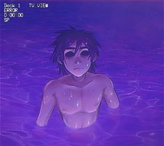 a naked man in the water with his eyes closed