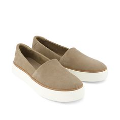 Where simplicity and style meet. With beige suede uppers and a white platform sole, the Kameron slip-on is the perfect companion for errands or play dates with the kids. CloudBound™ insoles provide comfort on days you need it most. Suede uppers. TOMS leather products support responsible manufacturing via the Leather Working Group. Rubber outsole. Removable Custom CloudBound™ foam insoles for all-day comfort and support. Hidden elastic gore for easy fit. Outsole height is approximately 1". TOMS i Womens Fall Slip On Shoes, Casual Work Tennis Shoes, Womens Slip On Shoes Casual, Cute Work Shoes For Women, Best Slip On Shoes For Women, Spring Suede Platform Loafers With Textured Sole, Suede Platform Loafers With Textured Sole For Spring, Spring Suede Slip-on Sneakers With Round Toe, Spring Suede Slip-on Platform Loafers