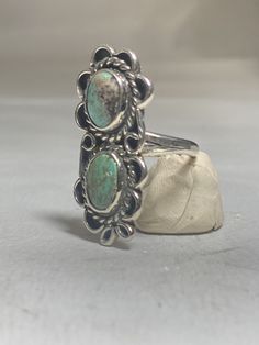 "long Turquoise ring Navajo southwest sterling silver women girls Signed LC Size 4.75 Weight 6.1g Length 1. 3/8\" Width 5/8\" Thinnest part of the band 1/8\" Free Shipping & Free Postal Insurance Delivered in a Gift Box If you do not want the ring polished and want to leave the natural patina please let me know at the time of purchase as I do polish rings before I ship rings out. Thanks USPS Domestic Shipping is free for buyers. If a buyer prefers to upgrade to priority, the buyer will pay t Onyx Ring, Moonstone Ring, Sterling Silver Bands, Silver Band, Unique Rings, Stone Rings, Turquoise Ring, Turquoise Bracelet, Silver Fashion