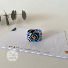 Welcome to my small business♡ Gaudi inspirational ring is made from high-quality Japenese Miyuki glass beads(not seed bead) ⚛ The width is 1.2 cm. See images to help find your ring size chart and don't forget to select your size in the dropdown menu. You can find many different designs in my shop👇 https://woodenboho.etsy.com/listing/1658237125 I am not accept returns or exchanges, this is because all my designs are made to order only for you. When you have any doubts about colors and sizes ets. Colorful Handmade Rings For Gifts, Colorful Handmade Rings As Gift, Colorful Handmade Ring Gift, Multicolor Bohemian Rings For Gifts, Bohemian Multicolor Rings For Gifts, Bohemian Multicolor Rings As Gift, Turquoise Beaded Rings As A Gift, Turquoise Beaded Rings As Gifts, Gift Colorful Beaded Round Rings