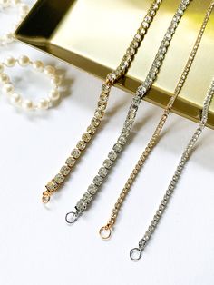 "This dainty crystal bracelet is the perfect accessory for a woman looking for an elegant touch to their wardrobe. Beautiful gift idea for a woman! 〔 𝐃 𝐞 𝐬 𝐜 𝐫 𝐢 𝐩 𝐭 𝐢 𝐨 𝐧 & 𝐒 𝐢 𝐳 𝐞 〕 Stainless steel chain in gold or silver color, clear rhinestones (2mm or 4mm/ 0.07\" or 0.15\"). Tarnish free and waterproof. ♥ Made in Europe - Riga, Latvia. ♥ Each bracelet is made to order which gives them a unique meaning! 〔 𝐏 𝐚 𝐜 𝐤 𝐚 𝐠 𝐢 𝐧 𝐠 & 𝐒 𝐡 𝐢 𝐩 𝐩 𝐢 𝐧 𝐠 〕 It takes 1 to 2 d Bracelet Cute, Unique Meaning, Fake Diamond, Bracelet Tennis, Riga Latvia, Crystal Chain, Bridal Bracelet, Rhinestone Bracelet, Silver Rhinestone