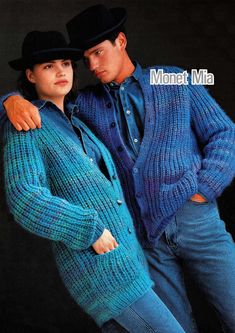 a man and woman in sweaters and hats