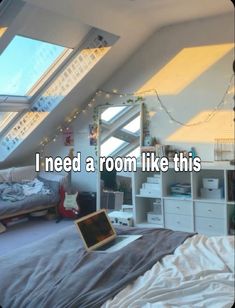 a bedroom with a laptop on the bed and an open window above it that says, i need a room like this