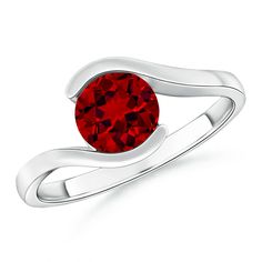 a ring with a red stone in the middle and a curved band around it, on a white background