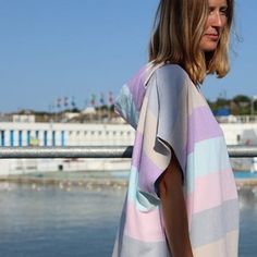 Go with the flow with our lightweight, colourful, cotton robe. Our generous fitting Flow Changing Robe is ideal for getting changed under before a swim, and makes a perfect beach cover up. Bright and breezy and made from 100% OEKO-TEX certified cotton they are a beach bag essential. If you love wild swimming, surfing, paddle boarding and beach life, you will love the generous fit of our long beach ponchos designed for easy changing. After an invigorating swim your poncho can double up as a swimm Spring Multicolor Cotton Cover-up, White Cotton Cover-up For Warm Weather, Oversized Multicolor Beachwear Cover-up, Short Sleeve Cotton Beach Dress For Beach Season, Spring Cotton Cover-up For Warm Weather, Spring Cotton Beach Dress For Loungewear, Cotton Summer Cover-up For Warm Weather, Summer Cotton Cover-up For Warm Weather, Multicolor Cotton Cover-up For Summer