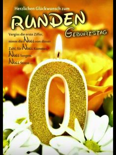 the number 0 candle is lit in front of flowers and daisies with an orange background