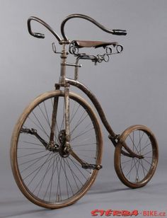 an old fashioned bicycle is shown in this image