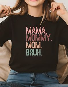 Celebrate the unique bond between mothers and their sons with this playful and heartwarming t-shirt. This tee is a perfect way to express your love and appreciation for your son. Made from soft, high-quality materials, it's both comfortable and stylish. Whether you're spending quality time together or simply want to show your support, this t-shirt is a must-have for any proud mom. - 100% premium cotton (Blackberry and Neon Blue are 50% cotton, 50% polyester) Mother's Day Crew Neck T-shirt, Cute Family T-shirt With Letter Print, Mother's Day Family Matching Crew Neck T-shirt, Black T-shirt With Funny Text For Mother's Day, Family Funny Print Graphic Tee, Mother's Day Black T-shirt With Funny Print, Family Matching Graphic Print T-shirt For Mother's Day, Family Matching T-shirt With Graphic Print For Mother's Day, Mother's Day Family T-shirt With Graphic Print