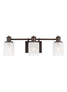 three light bathroom fixture with white glass shades on the bottom and an old bronze finish