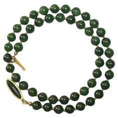 This beautiful, elegant, timeless necklace is made of high-quality natural Russian Siberian nephrite. The nephrite beads are top quality, uniform deep green, and they're sumptuous in how they look and feel. Authentic, natural color. No thermal or other mechanical treatments were used. This necklace alternates beads of nephrite with 2 mm 14K gold beads. The necklace fastens with a vintage gold plate clasp with natural jade cabochon. The length of the necklace is 19.5 inches (49.5 cm). The size of the smooth round nephrite beads is 8 mm. The weight of the necklace is 44 grams. This necklace is for those who appreciate and love classics. It is necklace absolutely charming. "You have to see it to believe it." Much more charming in reality! This is the perfect gift for yourself or someone speci Russian Jewelry, Dark Autumn, Vintage Beads Necklace, Nephrite Jade, Jade Necklace, Natural Jade, Deep Green, Gold Beads, Natural Color