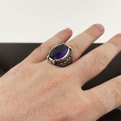 The ring is made of 925 sterling silver and adorned with Amethyst Stone. PRODUCT FEATURES -Products are shipped with free shipping with box and bag. - Crafting Material : 925K Sterling Silver - Weight : 15.0 grams - Gemstone Diameter : 15 x 20 mm - Gemstone :Amethyst Stone - Gender : Male / Female ✔ Ready to Ship in 1-3 Business Days ✔ Shipped to the worldwide 1-3 business days with free express shipping. ✔ The product will be sent to you with a box to avoid any damage during shipping. All items Amethyst Mens Ring, Luxury Men's Round Amethyst Ring, Luxury Amethyst Men's Jewelry, Luxury Men's Polished Amethyst Ring, Luxury Silver Amethyst Men's Ring, Amethyst Ring Silver, Male Ring, Alexandrite Stone, Ring Men