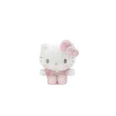 a hello kitty stuffed animal sitting on top of a white surface