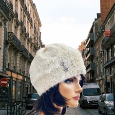 "I Designed and Hand Knitted this Slouch, Hat, Beanie, Cap. Ultra Soft, Luxurious feel, Warm Off White color in Mohair style. Top of the hat has a small silver flower . Right side of the Hat has 3 Decorative Silver Buttons. Right side of and top of that hat silver decorative buttons. Cozy, Warm, Roomy & Very Chic! Designed and Hand Knitted in California, USA. See All of My Original Design Four Seasons Trendy Fine Hand Knits listed in My Etsy Shop: \"Hand Knits 2 Love\" : Etsy.com/shop/handknits2 Evening Hat, Wool Cloche Hat, Hand Knits, Fleece Headbands, Ear Warmer Headband, Wide Brim Sun Hat, Female Head, Grey Leopard Print, Slouch Hat