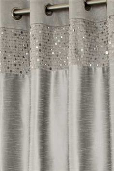 a curtain with silver sequins on it