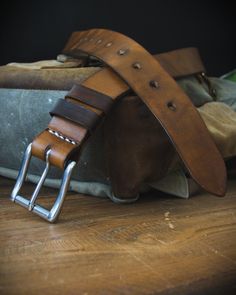 If you're looking for a classic, then look no further. Elegance and simplicity make this belt a faithful ally for every day. This brown belt won't go out of style any time soon - rock it with a pair of jeans and your favorite top or shirt. Full grain leather at 3.5-4mm thick combined with our quality workmanship will guarantee that this belt will last you a lifetime. The belt is 4cm wide. To choose the correct size, please use one of the following methods. 1) Take a tape measure and a belt you c Brown Belt Men, Rustic Brown Adjustable Belt, Masculine Brown Belt For Everyday Use, Luxury Brown Belt With Smooth Grain, Cheap Brown Men's Belt, Handmade Leather Belt, Leather Company, Brown Leather Belt, Brown Belt