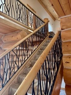 an iron and wood stair railing in a home