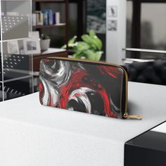 Decorative Black Red White Abstract Seamless Pattern Womens Zipper Wallet Clutch Purse. This stylish and functional Zipper Wallet is the perfect accessory to keep your essentials organized and secure. Using high-quality materials, it is crafted with meticulous attention to detail ensuring its longevity and resistance to wear and tear. The interior of the wallet is lined with a smooth fabric that prevents scratches on your items and provides a pleasant tactile experience every time you use it. This wallet combines fashion and practicality to meet all your daily needs. Whether you're shopping for yourself or a gift for a loved one, the Zipper Wallet makes for an ideal gift choice. Its practicality and style will surely be appreciated by anyone who receives it. .: Material: Faux Leather water Red Rectangular Wallet With Zipper Pouch, Black Wallet With Zipper Closure As Gift, Modern Red Wallet For Daily Use, Black Wallets With Zipper Closure As Gift, Red Wallets With Zipper Pouch For Everyday, Red Rectangular Wallet With Zipper Closure, Rectangular Red Wallet With Zipper Closure, Red Wallet With Zipper Closure For Daily Use, Versatile Red Wallet For Daily Use