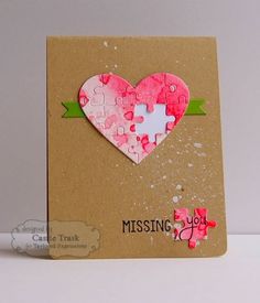 a card with a heart shaped puzzle on it