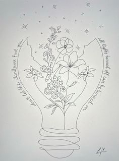 a drawing of flowers in a light bulb