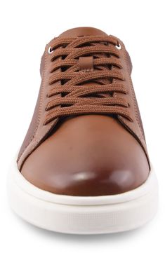 With a sleek monochromatic design, this white-sole sneaker adds casual style to a classic low-top sneaker. Synthetic upper, lining and sole Imported Modern Brown Sneakers With Translucent Outsole, Brown Leather High-top Sneakers With Translucent Outsole, Classic Lace-up Sneakers With Translucent Outsole, Classic Lace-up Custom Sneakers With Translucent Outsole, Brown High-top Sneakers With Translucent Outsole, Casual Custom Sneakers With Gum Sole, Classic Leather High-top Sneakers With Translucent Outsole, Casual Sneakers With White Sole, Casual Brown Custom Synthetic Sneakers