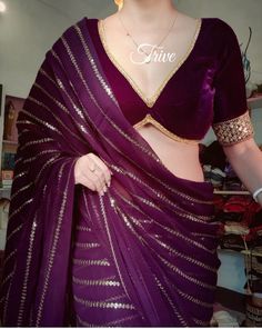 Made To Order Indian Designer Velvet velvet Saree Lehenga Blouse Deep V Neck Elbow Length Sleeves blouse This Made to Order/Made to Measurement/Custom Made Indian Ethnic Blouse. - Fabric - Velvet - Color - wine - Princess Cut - Rich Lined -  elbow sleeves - Extra margin and extra stitches included in the blouse - It can be customize in any color, design or size  PLEASE NOTE: BUYERS ARE RESPONSIBLE FOR ANY CUSTOMS AND IMPORT TAXES THAT MAY APPLY. This is a made to order product. If you opt for 'M Velvet Blouse Sleeves Design, Wine Colour Blouse Design For Saree, Velvet Saree Blouse Design, Velvet Blouse For Party, Fitted Velvet Choli For Festive Occasions, Purple Pre-draped Saree For Celebration, Festive Velvet Choli For Navratri, Velvet Party Saree, Velvet Party Sets