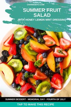 a white bowl filled with fruit on top of a table