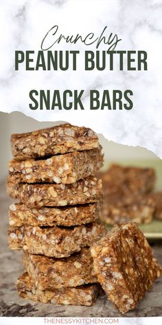 peanut butter snack bars stacked on top of each other with text overlay that reads crunchy peanut butter snack bars