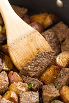 steak and potatoes in a skillet with a wooden spatula on top that says, how to cook sirloin steak and potato bites