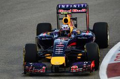 a red bull racing car on a race track