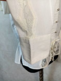 Vintage white cotton lace trim long sleeve blouse with silver tone metal buttons top. The label shows 100% cotton Great vintage condition Flat measurements: shoulders- 40 cm/ 15.8'' chest/armpit to armpit/ - 49 cm/ 19.4'' long - 54 cm/ 21.2'' sleeve/ from shoulder/ - 60 cm/23.6'' Fits like size M Fitted Cotton Shirt With Lace Trim, Fitted Cotton Blouse With Lace Sleeves, Cotton Lace Trim Button-up Blouse, Cotton Button-up Blouse With Lace Trim, Cotton Blouse With Lace Trim, Button-up, Fitted Button-up Blouse With Lace Trim, Fitted Button-up Shirt With Lace Trim, Fitted Lace Trim Button-up Shirt, Cotton Tops With Lace Cuffs And Long Sleeves