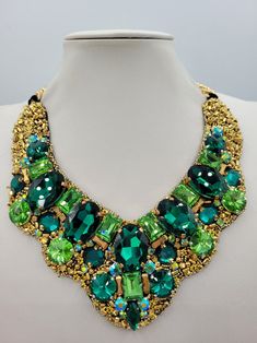 Party Crystal Emerald Necklace, Party Emerald Crystal Necklace, Green Costume Jewelry Necklace, Green Crystal Necklace With Jewels, Unique Rhinestone Necklaces For Gifts, Unique Rhinestone Necklace For Gifts, Gift Necklace With Rhinestones, Green Jeweled Necklaces For Party, Green Jeweled Choker Necklace