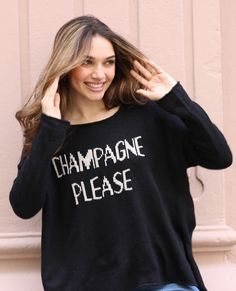 The perfect combination of casual and festive for your New Year's outfit. Tissue soft and lightweight crew with the words "Champagne Please" knit directly into the center front. The open crew neckline is flattering and keeps this top feeling light and airy. Oversized, boxy fit with a fitted sleeve. Measurements for S/M: Chest Width (1" down from armholes): 26" Length (from highest point shoulder to hem): 24.5" Composition: 76% Acrylic, 12% Mohair and 12% Wool CARE All of our Wooden Ships Knits a New Years Outfit, Black Khakis, Cool Sweaters, Boyfriend Fit, Personal Marketing, Ladies Boutique, Light Weight Sweater, Black Media, The Words