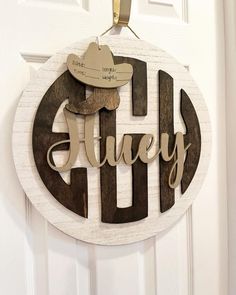 a door hanger with the word'silly'cut out in wood on it