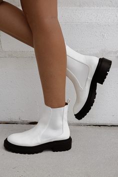 White vegan leather boot. Lifted by a short black flatform. This style runs true to size. This item is Final Sale. White Combat Boots, Combat Boots Style, Vegan Leather Boots, Fall Booties, Trendy Boots, Fall Styles, Wardrobe Inspiration, Combat Boot, Leather Boot