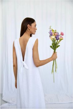 Spring Linen Maxi Dress With Tie Back, White Linen Dress With Tie Back For Spring, Spring White Linen Dress With Tie Back, Elegant Linen Beach Dress With Tie Back, White Sleeveless Linen Dress With Tie Back, Sleeveless Linen Sundress For Brunch, Sleeveless Linen Maxi Dress With Tie Back, Chic Linen Dress With Tie Back For Vacation, Sleeveless Linen Dress With Tie Back For Brunch