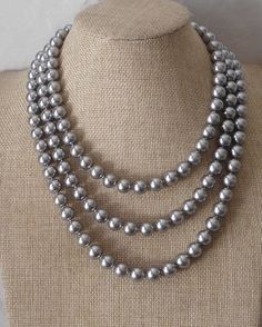 PREFERENTIAL POLICIES : The order is $20 or more.There will be a 10% discount.long-term effective. Please use the coupon code: CZH10 Welcome back to my shop: https://www.etsy.com/shop/pearlandjewelry Description of the product in the picture: The necklace lengh is 60 inches ,I make the necklace to use 10mm gray glass pearls, The pearls are individually hand knotted . IT is good necklace for your great wedding, The picture color is gray. Can choose other colors are:ivory,white,light pink,Black, r Gray Pearl Jewelry For Party, Elegant Gray Necklace For Wedding, Good Necklace, Bride Pearl Necklace, Bridesmaid Pearl Necklace, Gray Pearl Necklace, Ivory Pearl Necklace, Temple Jewellery Earrings, Pink Pearl Earrings