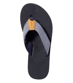 Adjustable Black Flip Flops For Surfing, Comfortable Adjustable Flip Flops With Ortholite Insole, Comfortable Flip Flops With Arch Support For Swimming, Comfortable Flip Flops With Arch Support For Casual Use, Adjustable Round Toe Flip Flops For Surfing, Comfortable Surfing Flip Flops With Textured Footbed, Comfortable Flip Flops With Textured Footbed For Surfing, Adjustable Flip Flops For Surfing, Printed Flip Flops