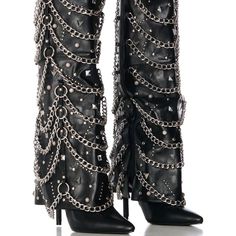 Strut Like The Whole World Is Your Runway In The Azalea Wang "Rockstar Rebel" Black Embellished Hardware Fold Over Boot. Crafted Using A Luxurious Faux Leather Upper, This Bad-To-The-Bone Style Features A Knee-High Fold Over Shaft, A Pointed Toe Silhouette, Tonal Stitching, A Slightly Covered Slim Stiletto Heel, A Comfortable Cushioned Insole, Faux Silver Metallic Hardware, A Pull-On Fit, And An Inner Ankle Zipper Closure. Complete With An Ultra-Decorated Body, Consisting Of Pointed Pyramid And Rockstar Accessories, Rockstar Boots, Concert Shoes, Rockstar Pants, Cover Boots, Rockstar Fashion, Crazy Heels, Odd Fashion, Fold Over Boots