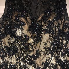 Never Worn Cocktail Dress With Beautiful Stones. Overlay Is Black Lace With A Gold Layer Beneath. Purchased For A Pageant But Ended Up Choosing To Wear Something Different. Size 6, Fits Like A Size Small!!! Black Embellished Dress For Prom, Black Lace Mini Dress For Prom, Glamorous Black Lace Evening Dress, Black Embellished Sleeveless Dress, Black Lace Dress For Party Season, Black Embellished Lace Dress, Black Lace Embellished Dress, Glamorous Black Lace Mini Dress, Glamorous Black Lace Dress