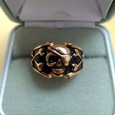 Thank you for visiting the SoChicFinds store - vintage and antique, costume and fine jewelry.  Jolly Roger pirate ring. Metal: jewelry blackening brass.  The scull ring is a size:  diameter 19mm (US- 9; EU-60 ) Excellent condition. Jolly Roger Pirate Male Ring, Scull Blackening Brass Ring Size 9, Brutalist Costume Jewelry for Guys Black Metal Skull Ring As Gift, Black Metal Skull Ring Gift, Black Metal Skull Ring For Gift, Vintage Black Rings For Halloween, Vintage Black Metal Skull Ring, Vintage Gold Jewelry For Halloween, Vintage Black Skull Ring As Gift, Vintage Black Skull Ring Gift, Steampunk Gold Jewelry For Halloween