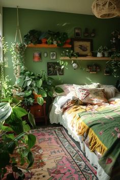 a bedroom with green walls and lots of plants