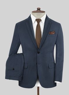 Radiate an aura of poise and grace on every occasion with our exquisite Scabal Nim Herringbone Blue Wool Suit. Tailored using the finest wool fibers, this suit boasts a serene blue color scheme with a herringbone design that seamlessly enhances your office wear collection as well. Elevate your sartorial prowess with this timeless ensemble that is bound to leave a lasting impression! 
  Look Includes     Scabal Nim Herringbone Blue Wool  Fabric  Two Button Jacket Style  Notch Lapel   Horn Royal B Fort Wedding, Specter Suits, Harvey Specter Suits, Sharkskin Suit, Grey Wool Suit, Fancy Dinner Party, Flannel Suit, Harvey Specter, Tailored Suit